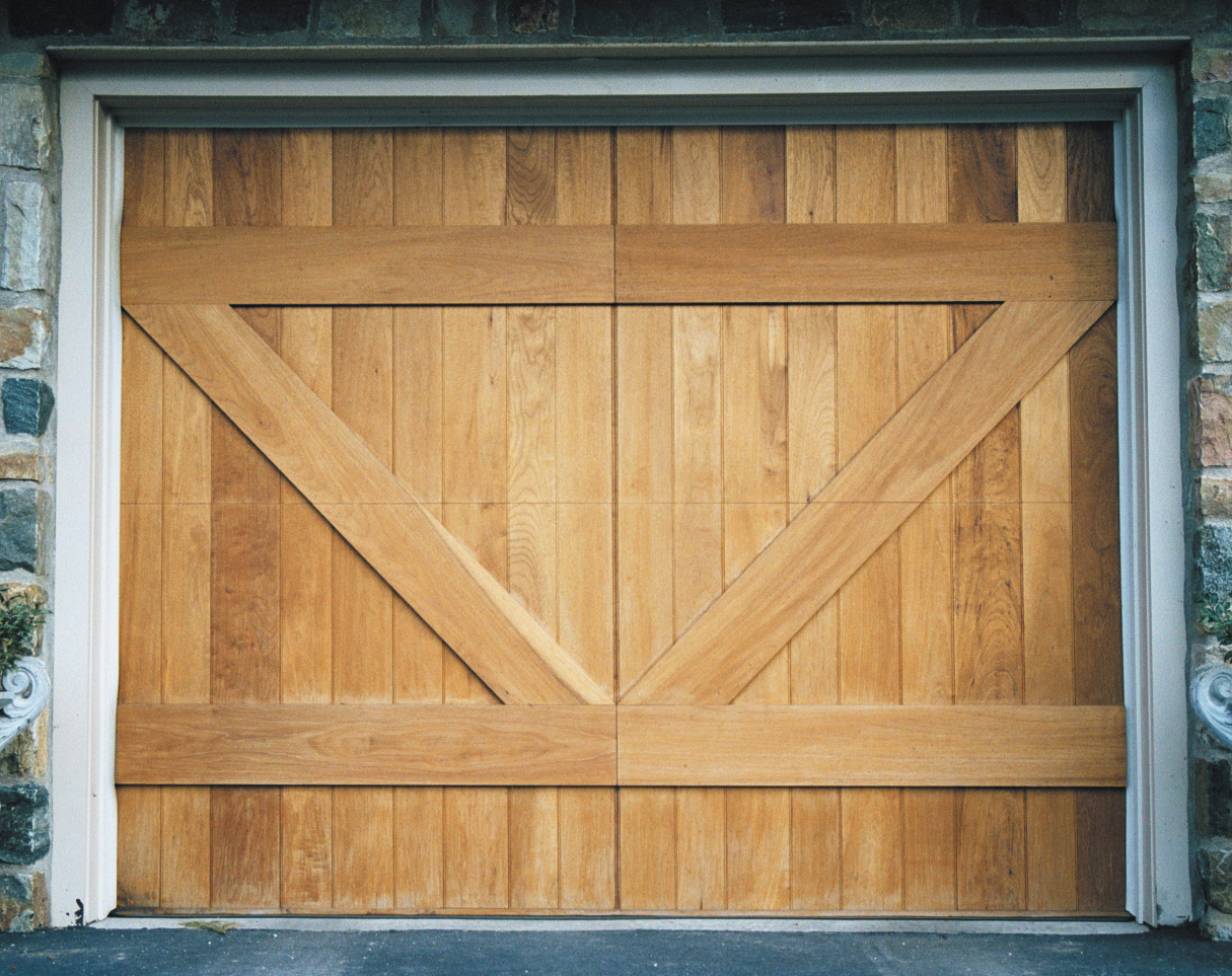Custom barn-style door with no perimeter trim boards