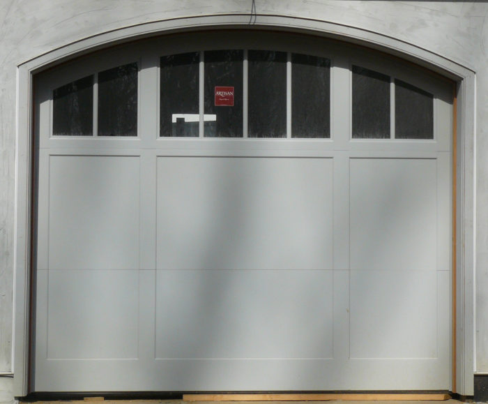 Custom trifold-style door with 8 lites