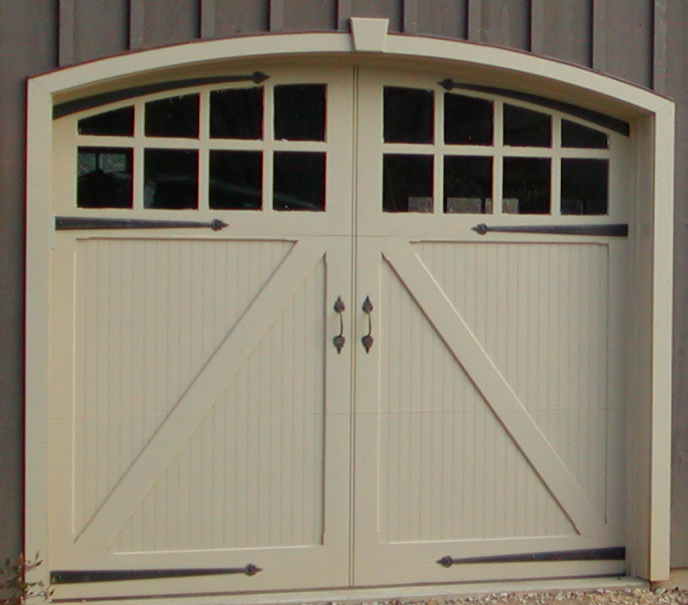 swing-style door with decorative heart strap hinges