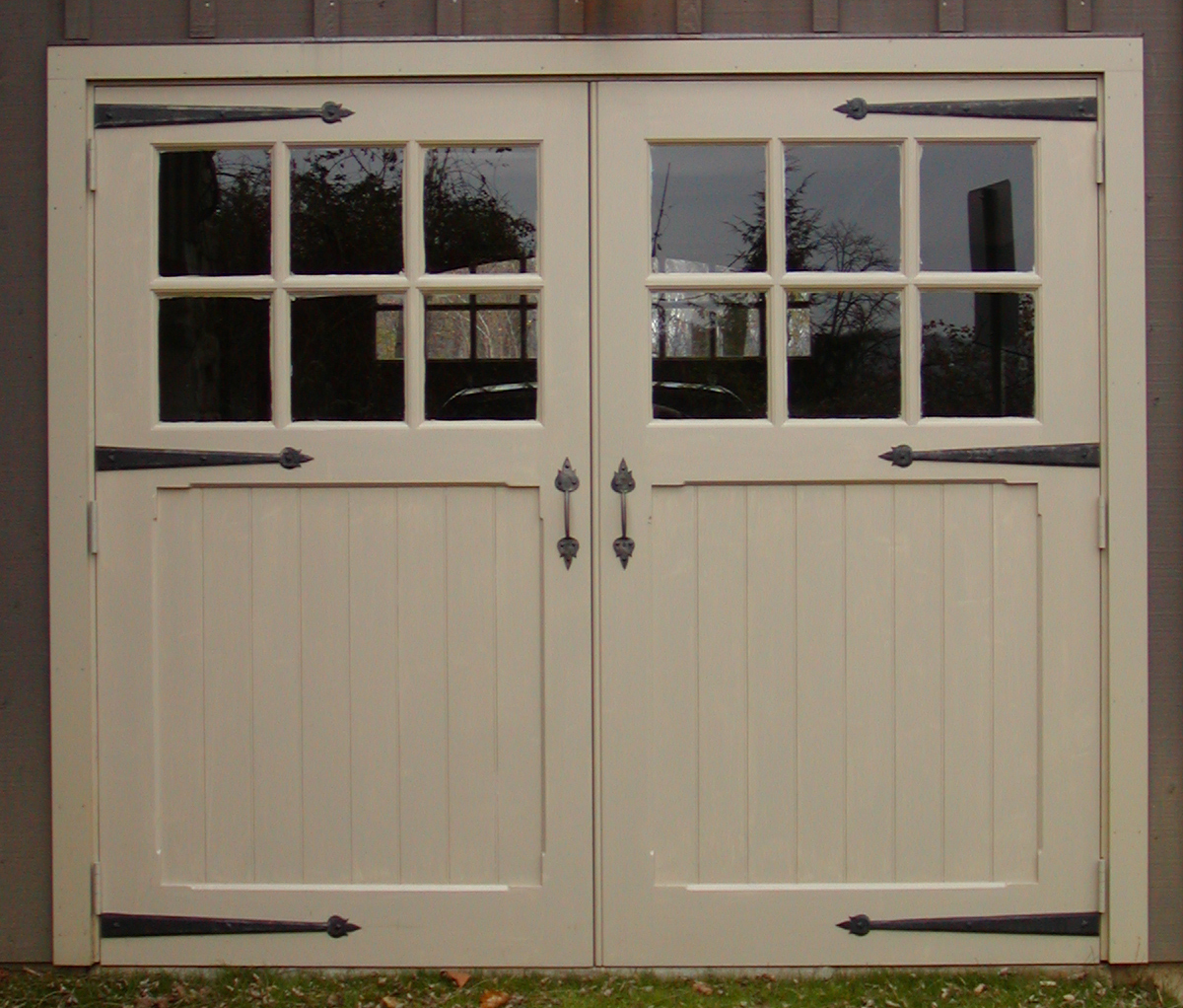 True swing, double out-swing door with 12 lites