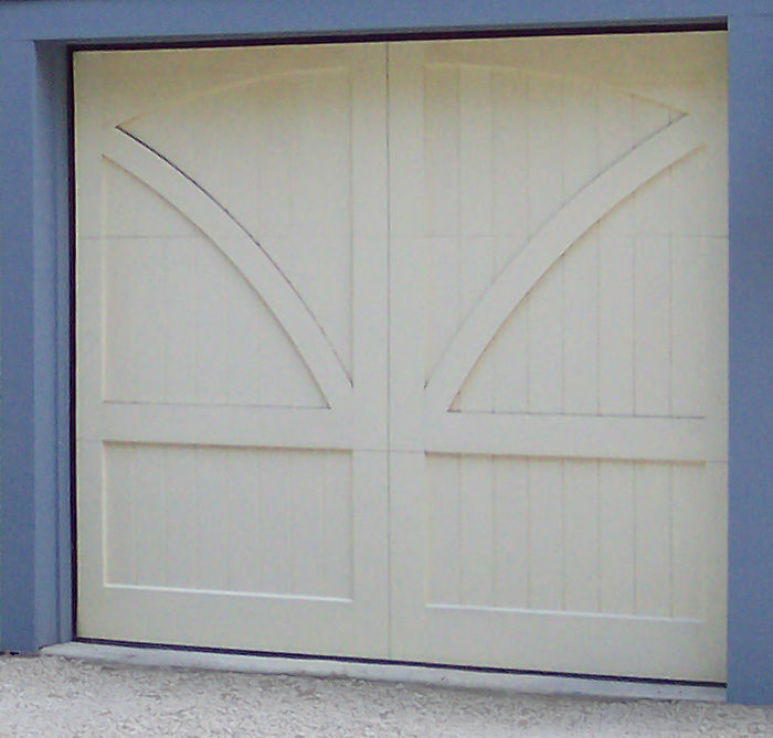 Swing style Barn door with a solid arch top