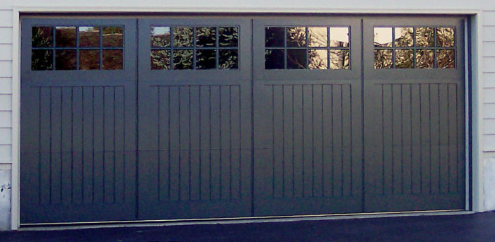 Wooden swing-style double door with 32 lites