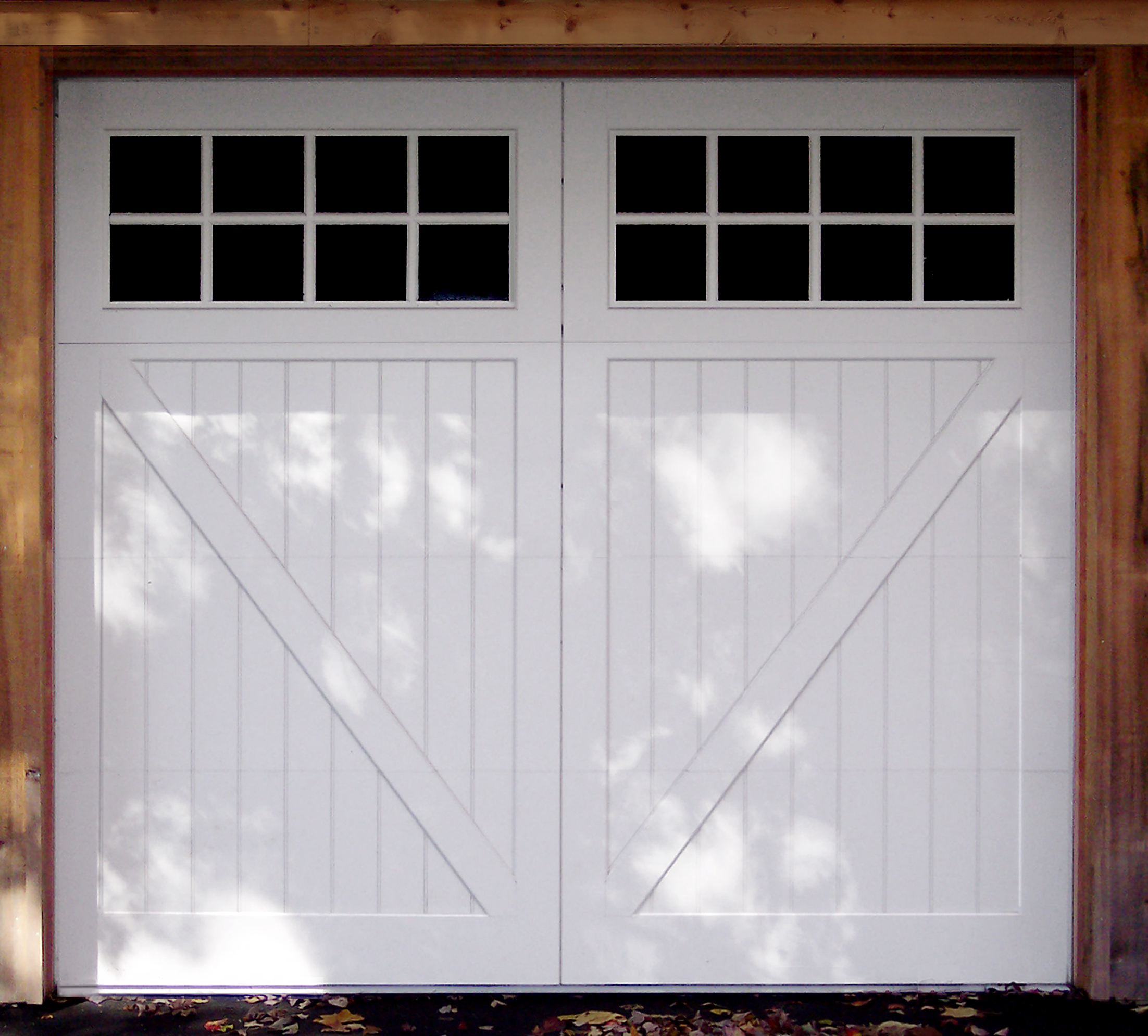 Swing-style door with 16 lites and 2 beaded panels