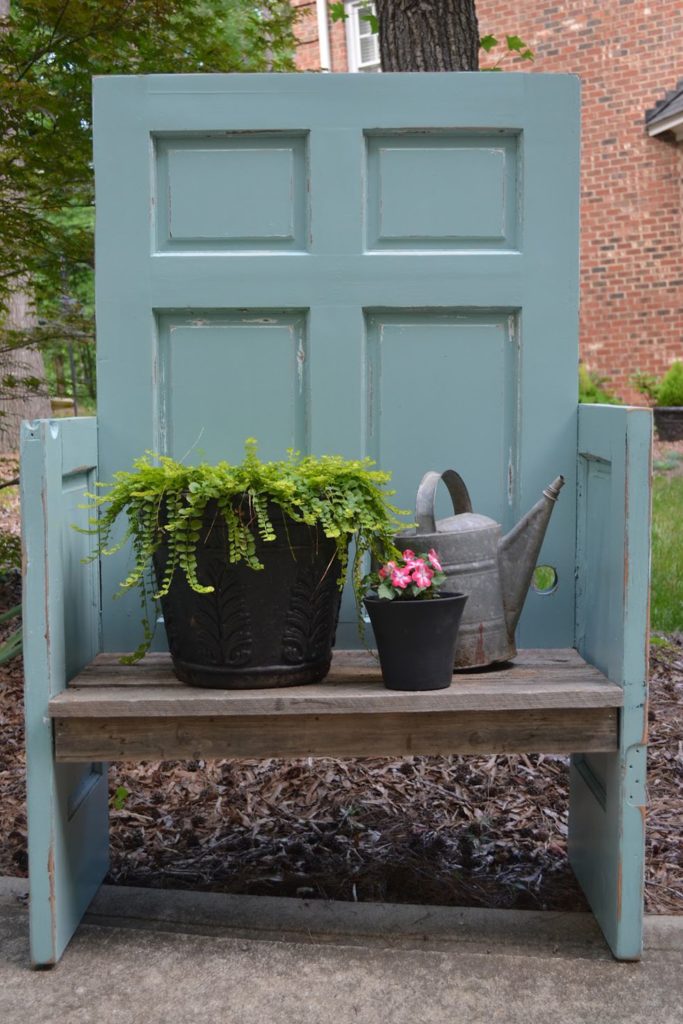 garden bench made from a wooden door