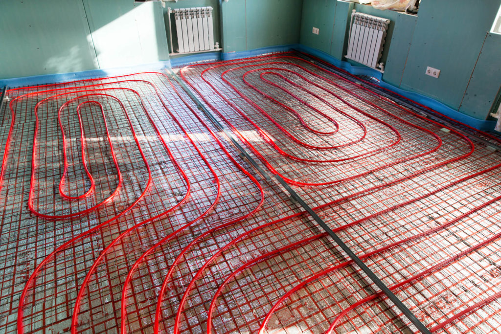 An in-surface radiant heat system in the floor of a garage.