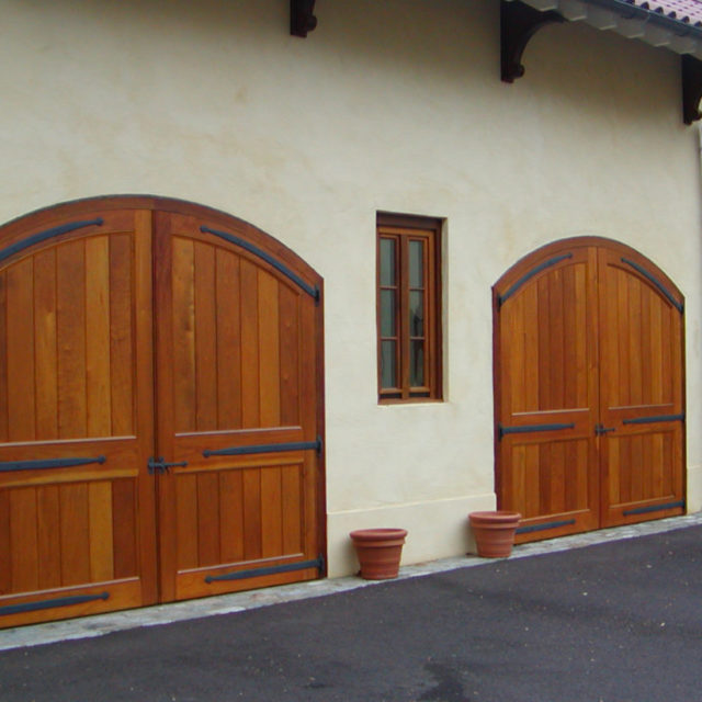 Custom wood stained slide out carriage style garage door