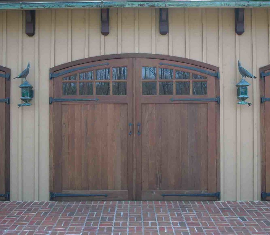 Custom arched swing out garage door