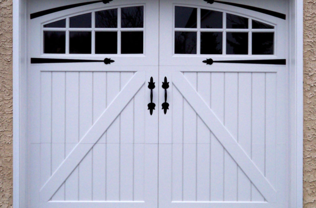 Swing style garage door windows on a white vinyl garage door