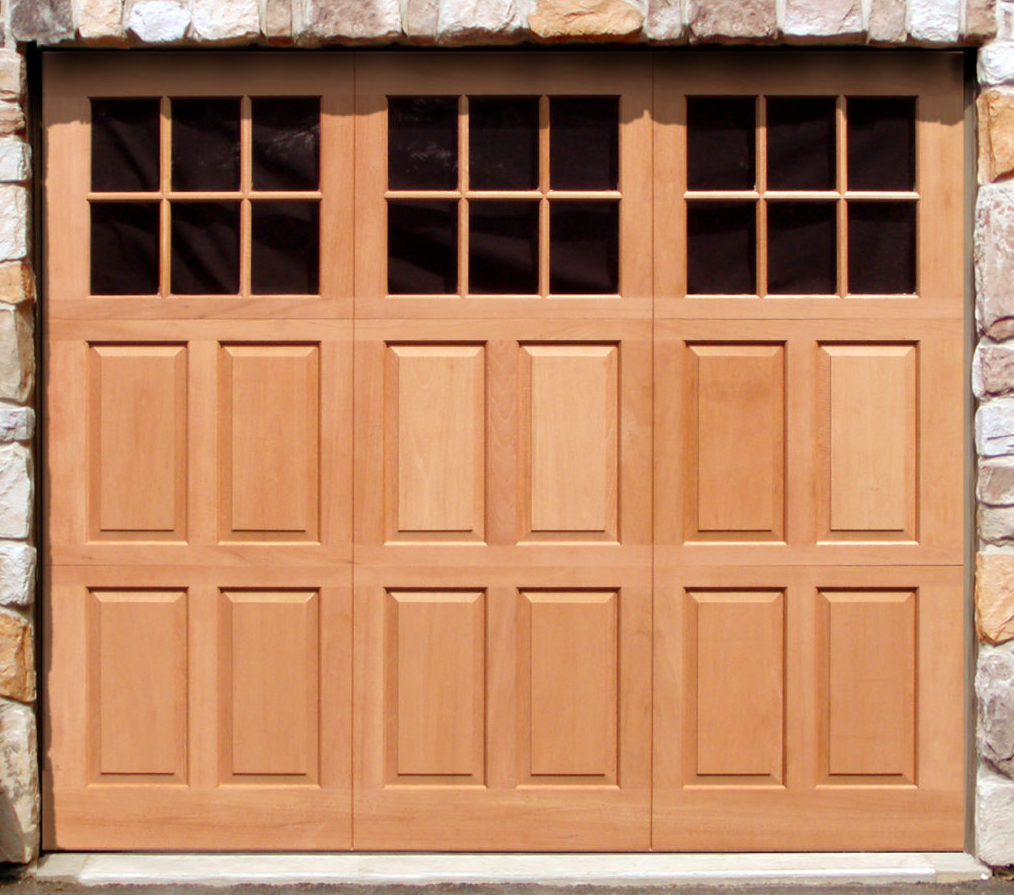 Trifold garage door windows on a wooden garage door