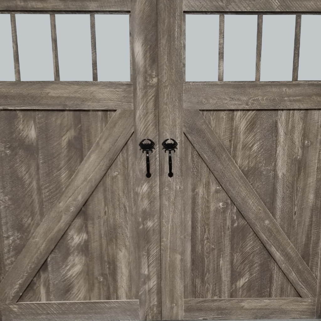 Exterior of faux wood garage door with crab door handles