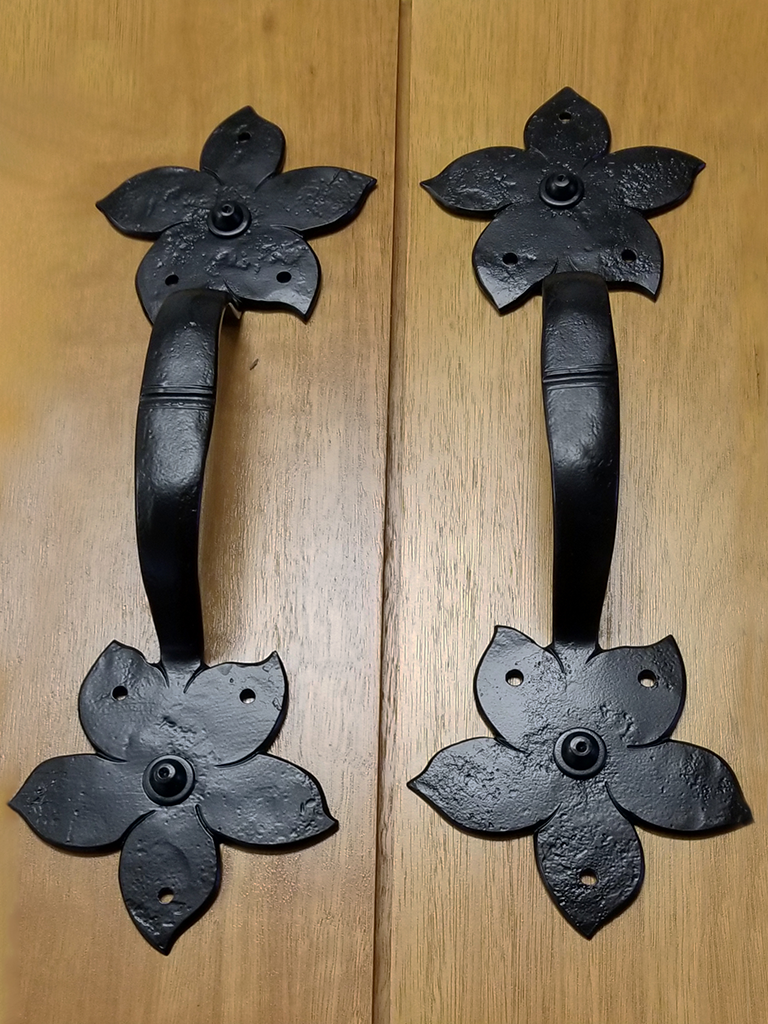 Custom flower garage door handles from Artisan Custom Doorworks