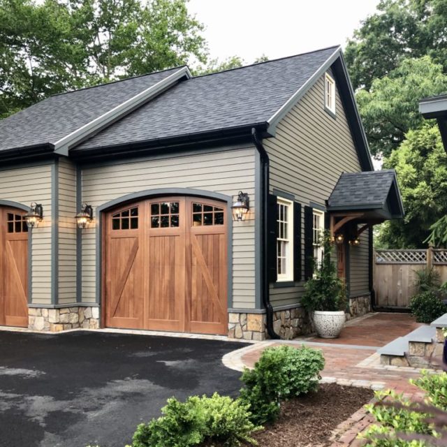 Real wood garage doors installed on an detached two car garage
