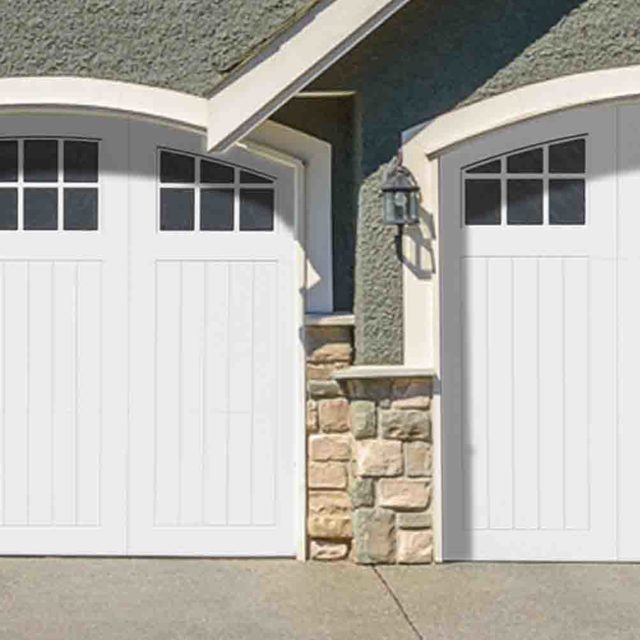 Arched White Wood Composite Garage Door