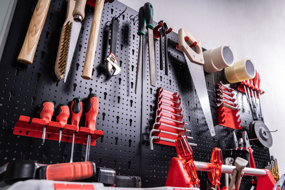Extending a garage can provide more room for a workbench and tools.
