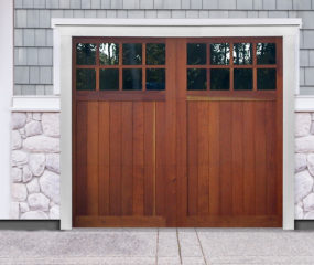 Brown swing out wooden garage door with two windows