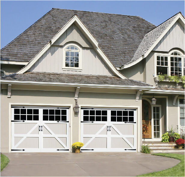 Wooden carriage style garage doors.