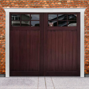 Dark brown stained wooden garage door with rectangular windows on brick garage