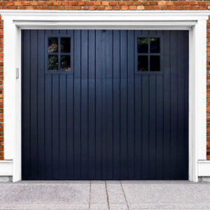 Black wooden garage door with two rectangular windows on brick garage