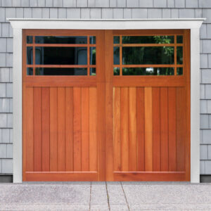 Brown wooden swing out carriage garage door with two windows