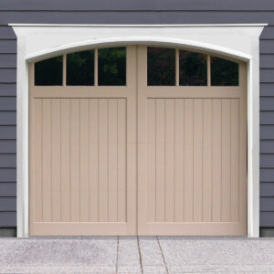Beige arched swing out garage door with two windows on gray garage
