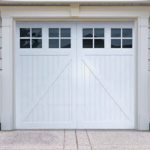 Prelude 2, a white vinyl carriage garage door, from Artisan Custom Doorworks