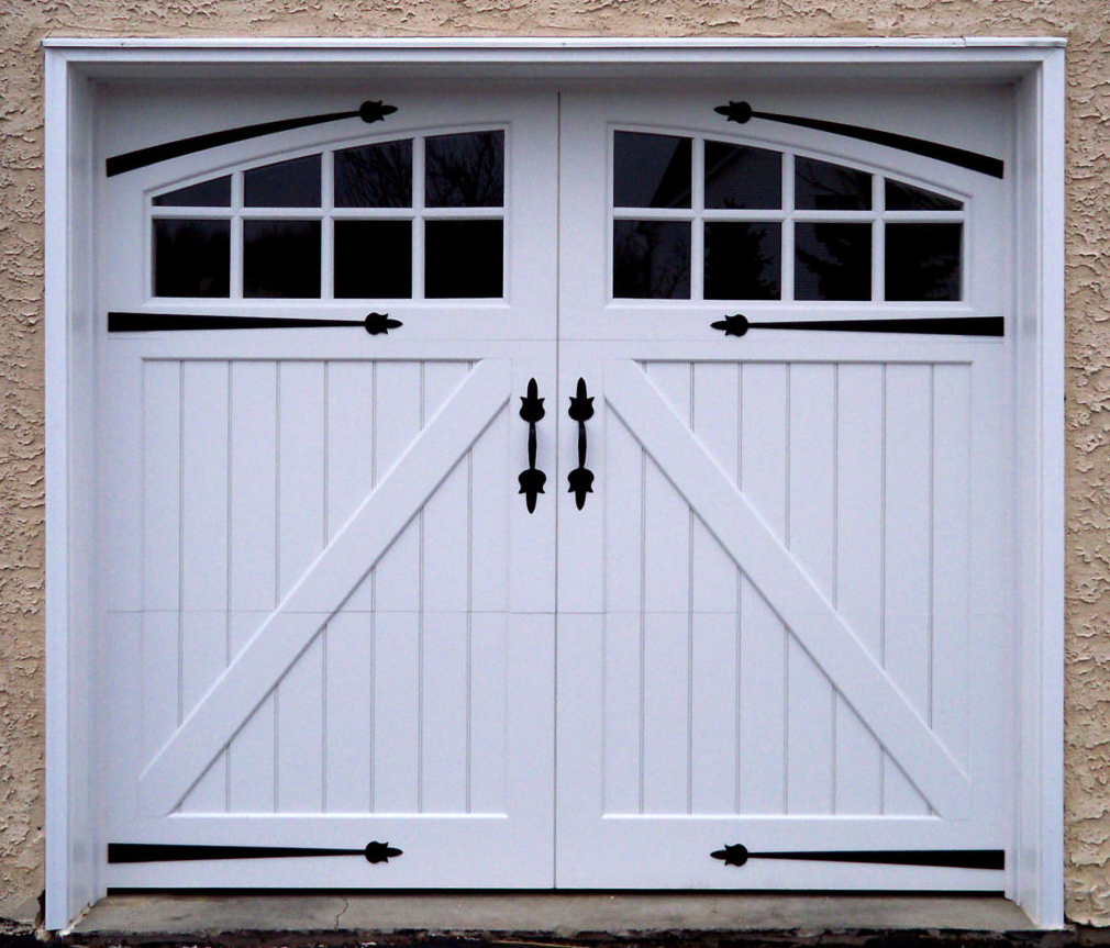 Swing style garage door windows on a white vinyl garage door