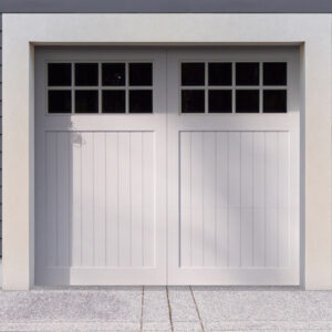 White vinyl carriage house garage door with two panels and windows