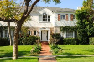 A grand and classic home with brick and vinyl