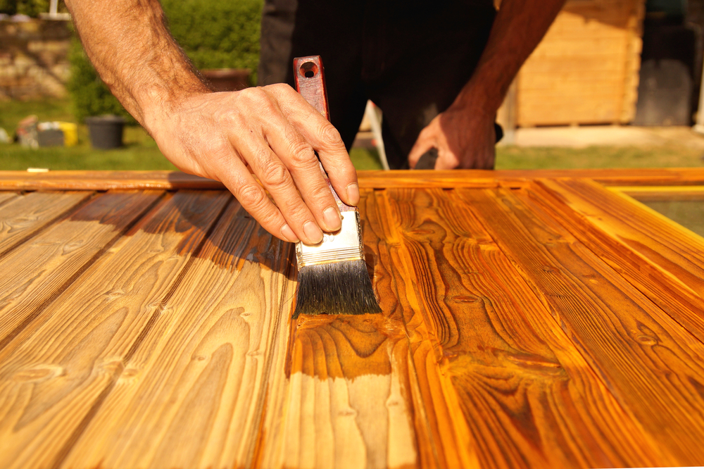 Stains offer a beautiful natural finish for your garage door.